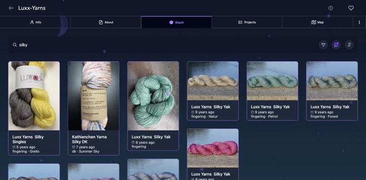 A yarn stash in the Deep Space colour theme, with a night sky and a moon behind the page